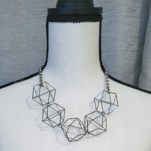 Silver geometric shape statement necklace
